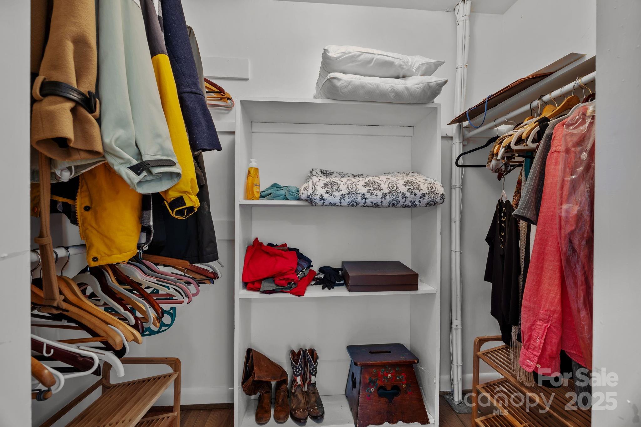 241 Stonewall Road Salisbury, NC 28144 - Photo 34 of 48 a view of walk in closet with clothes and shoes