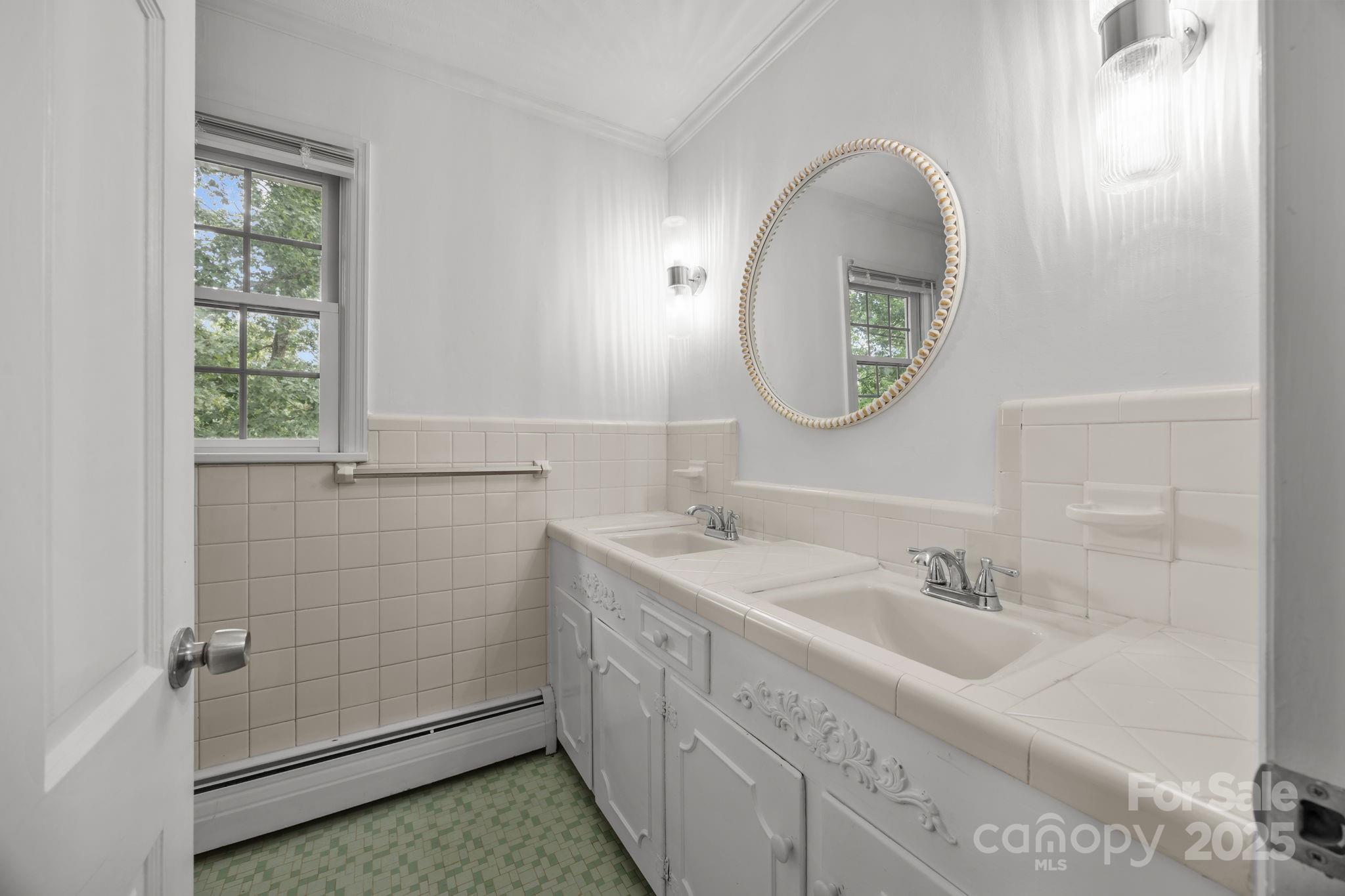 241 Stonewall Road Salisbury, NC 28144 - Photo 35 of 48 a bathroom with a sink and a mirror