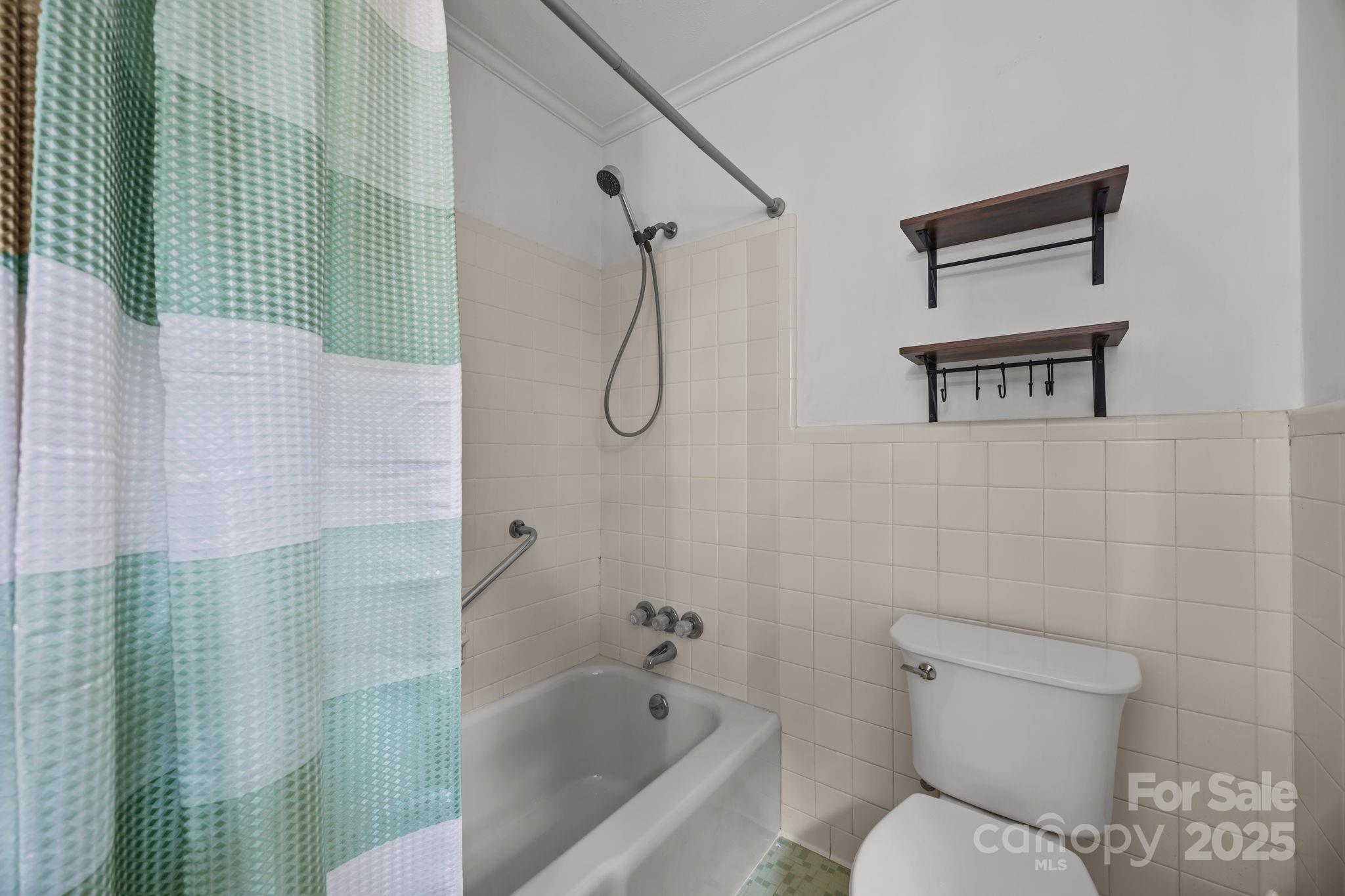 241 Stonewall Road Salisbury, NC 28144 - Photo 36 of 48 a bathroom with a toilet and a shower