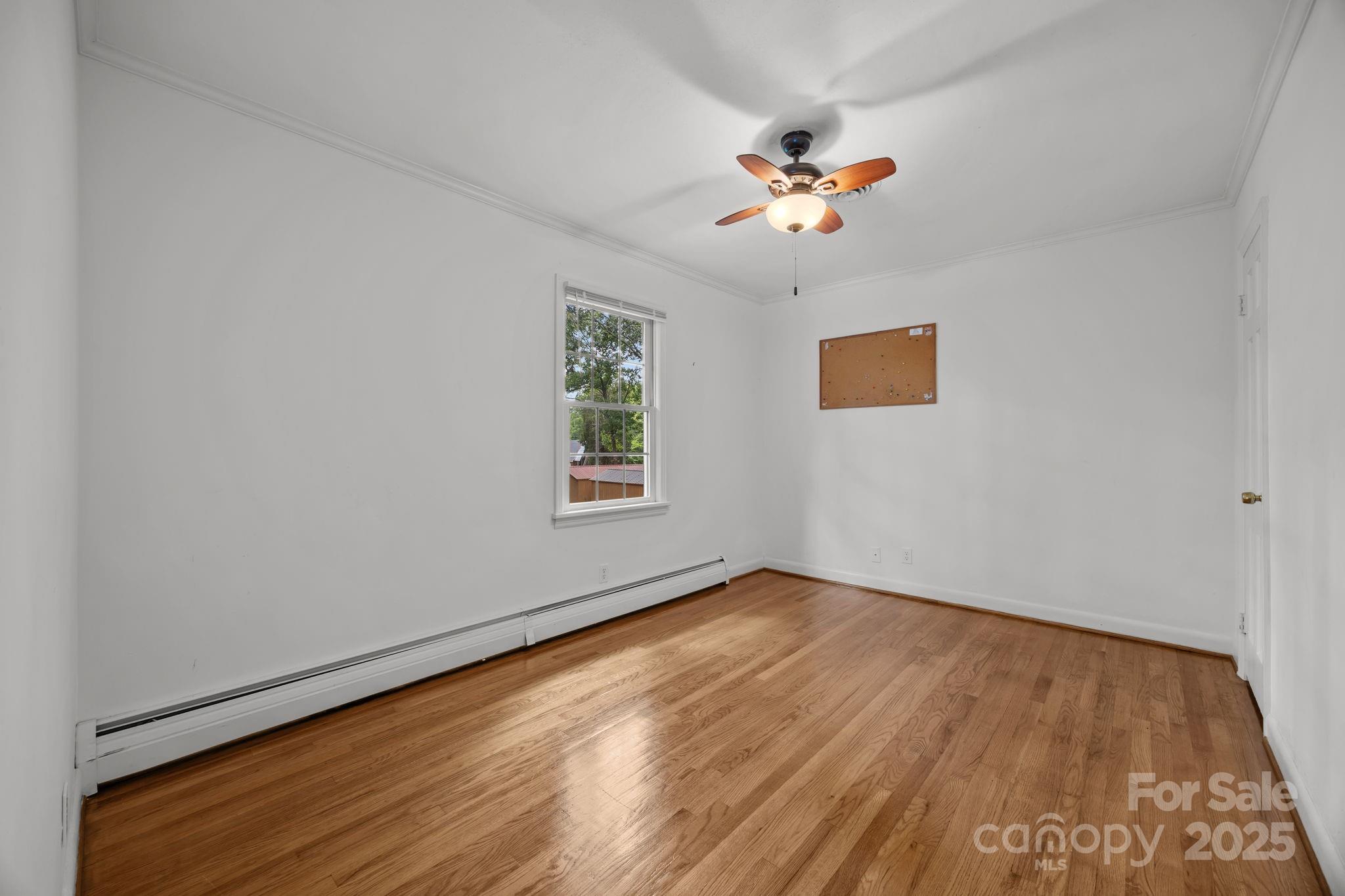241 Stonewall Road Salisbury, NC 28144 - Photo 37 of 48 wooden floor in an empty room with a window