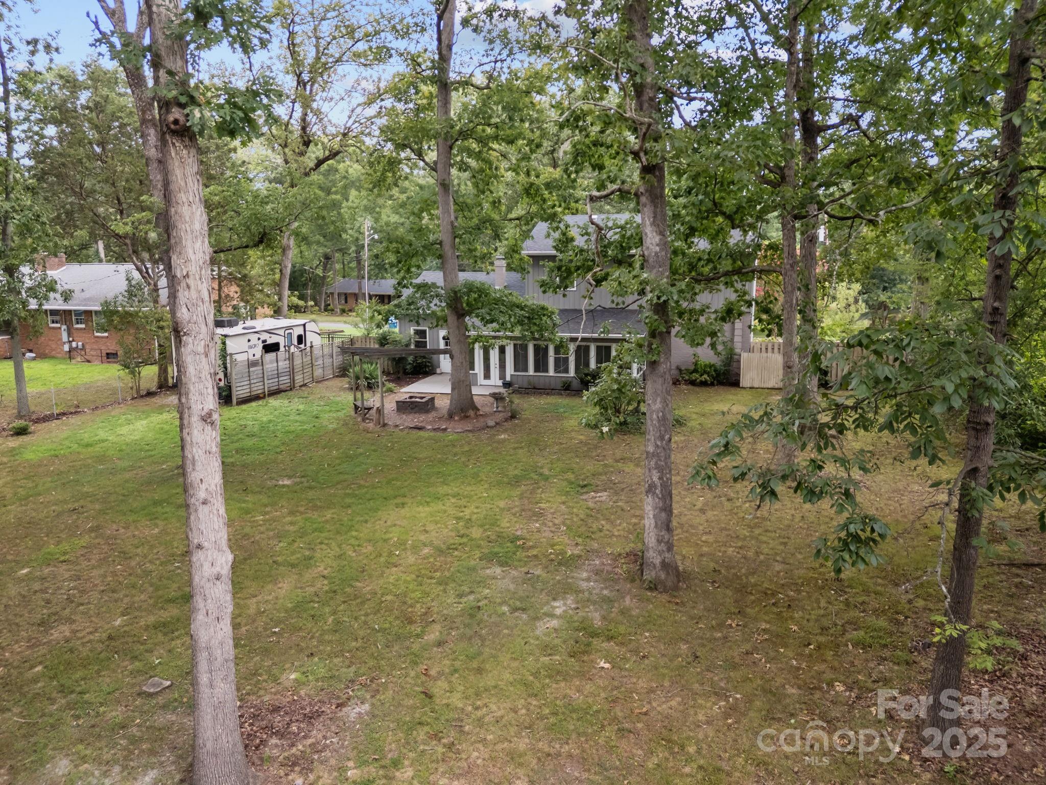 241 Stonewall Road Salisbury, NC 28144 - Photo 44 of 48 a view of a garden with a slide