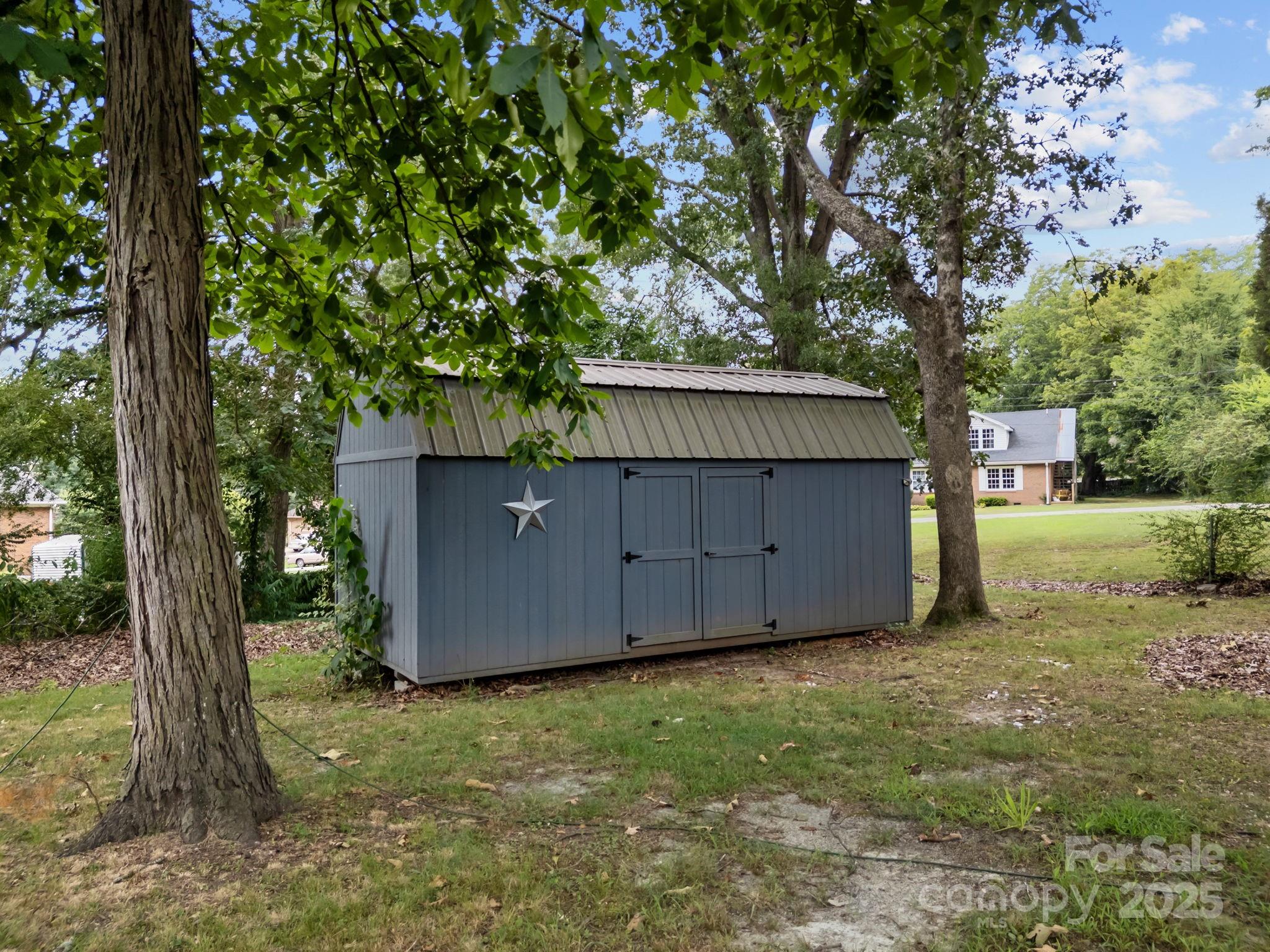 241 Stonewall Road Salisbury, NC 28144 - Photo 47 of 48 a backyard of a house