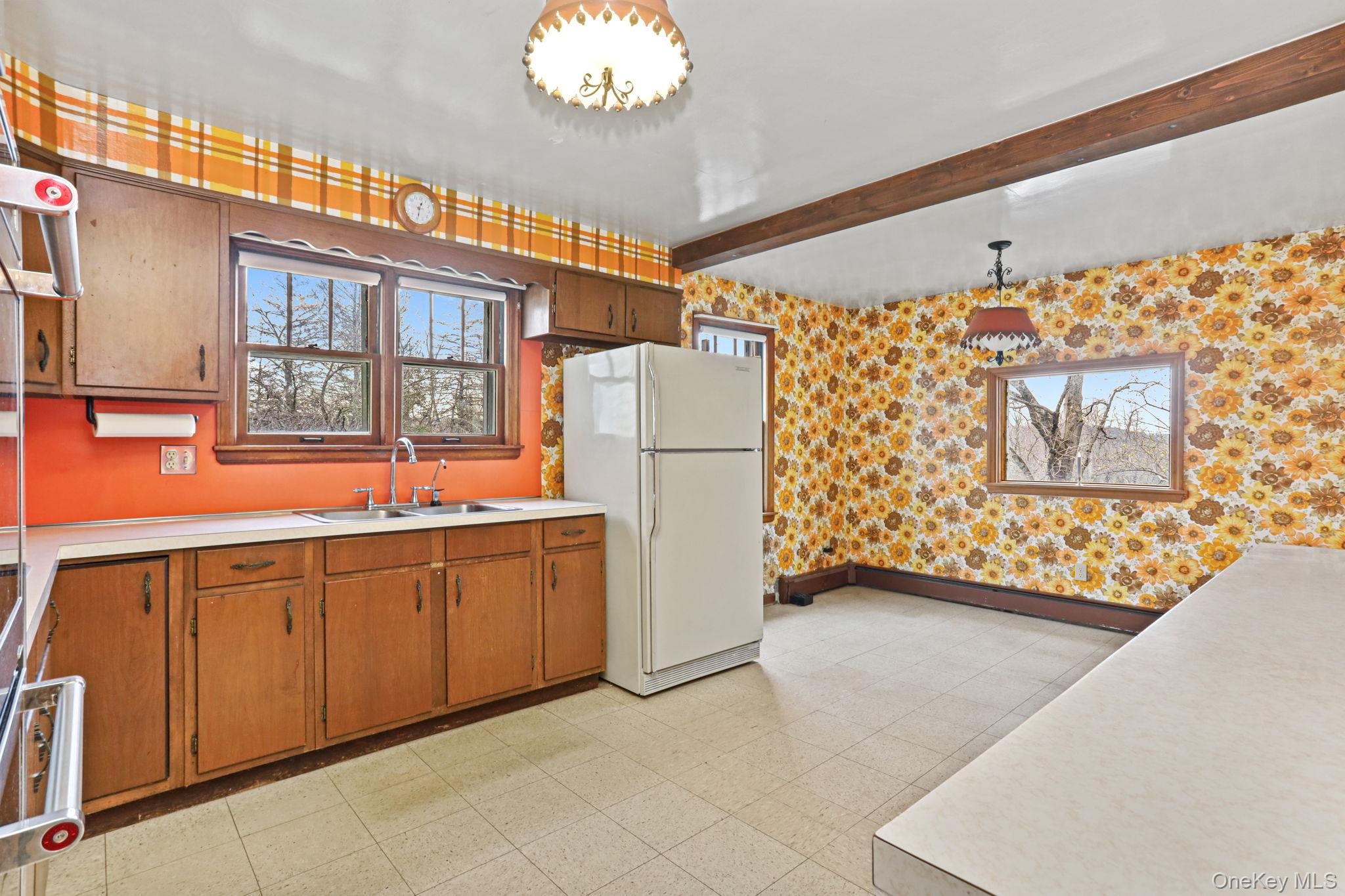 770 Gahbauer Road Hudson, NY 12534 - Photo 8 of 39 a kitchen with stainless steel appliances granite countertop a refrigerator and a sink