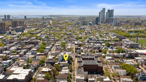 an aerial view of a city with lots of residential buildings