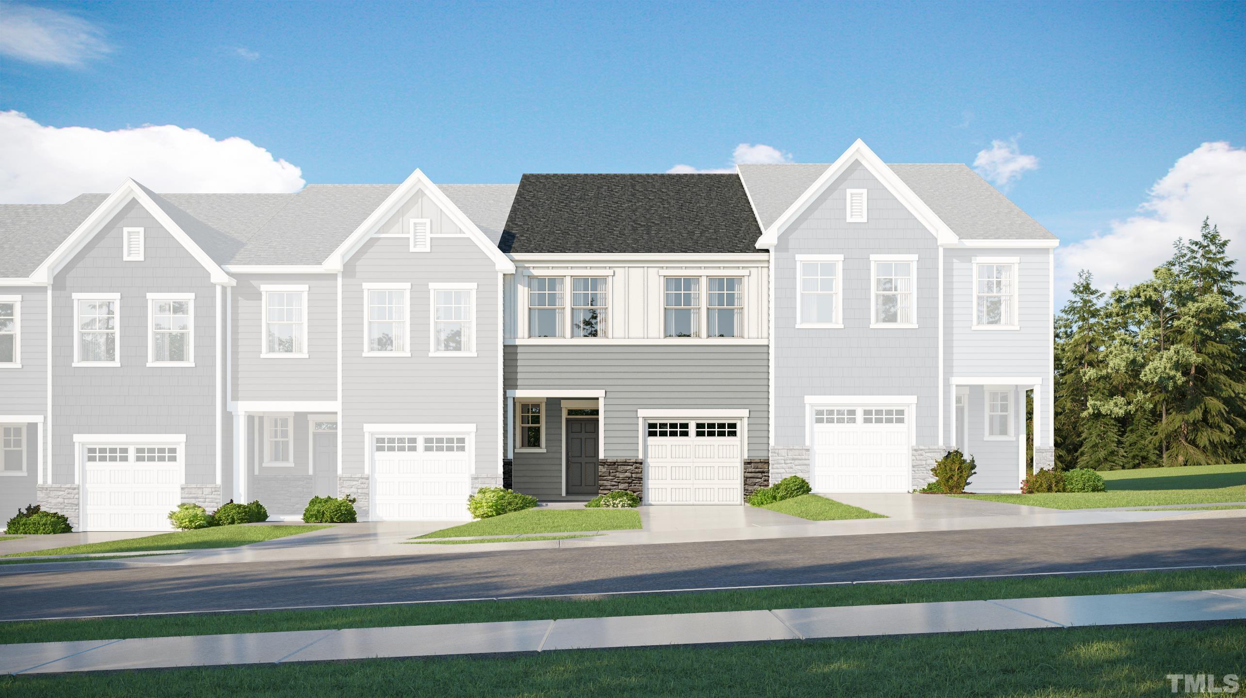 1623 Emory Ridge Way Wake Forest, NC 27587 - Photo 1 of 25 a front view of residential houses with yard and road