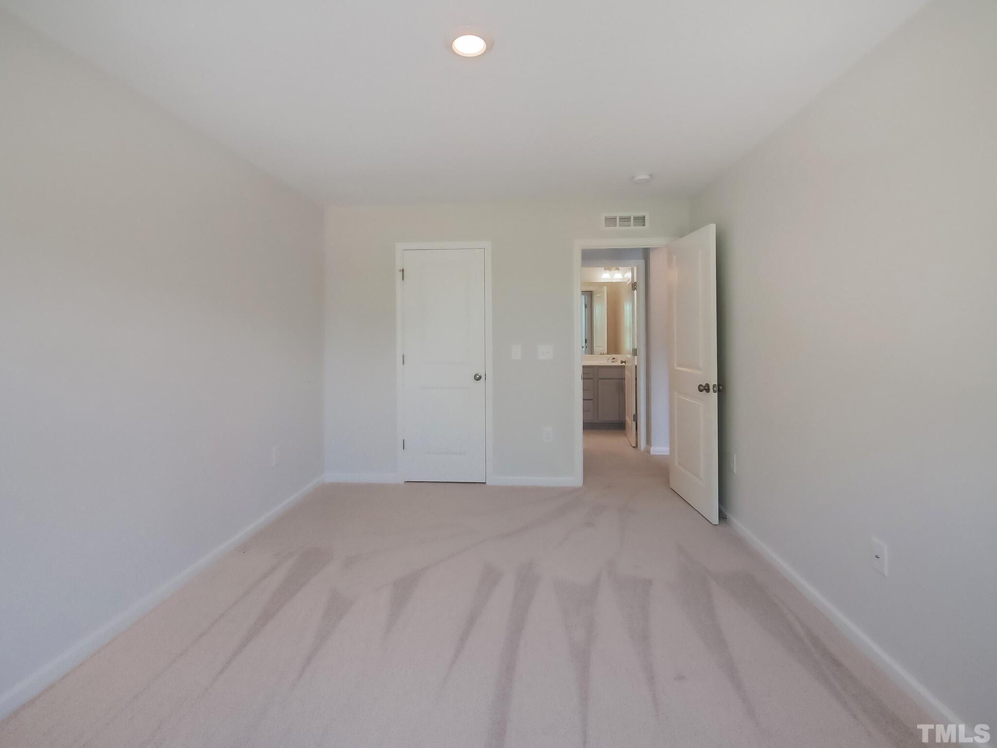 1623 Emory Ridge Way Wake Forest, NC 27587 - Photo 23 of 25 a view of an empty room