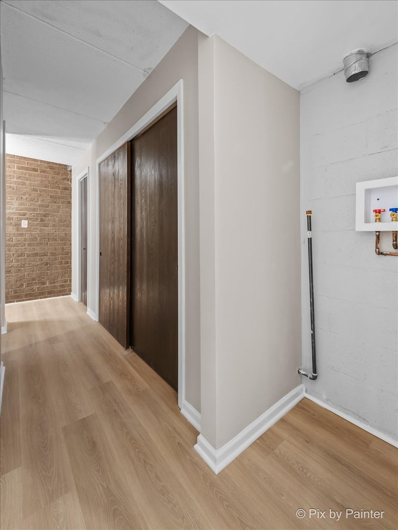 712 Kenneth Circle Elgin, IL 60120 - Photo 19 of 27 a view of an empty room with closet and a window