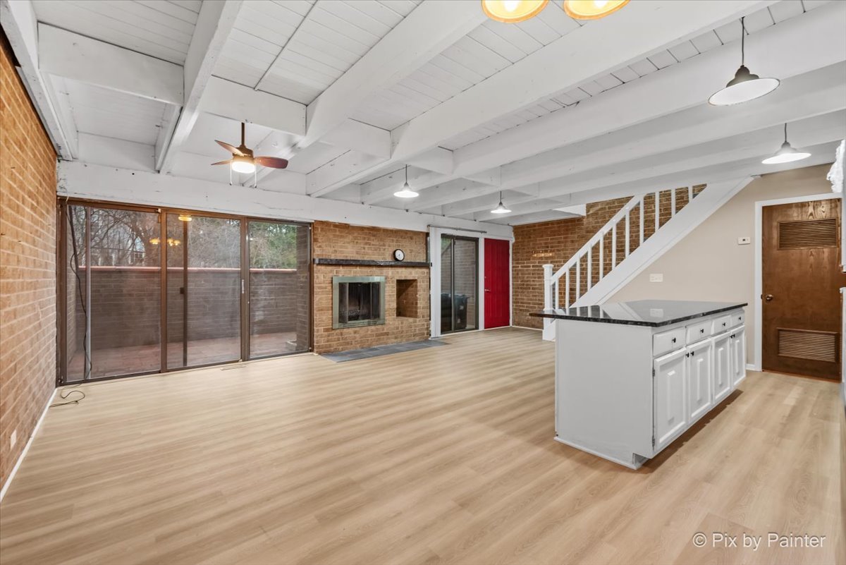 712 Kenneth Circle Elgin, IL 60120 - Photo 9 of 27 a view of an entryway with wooden floor