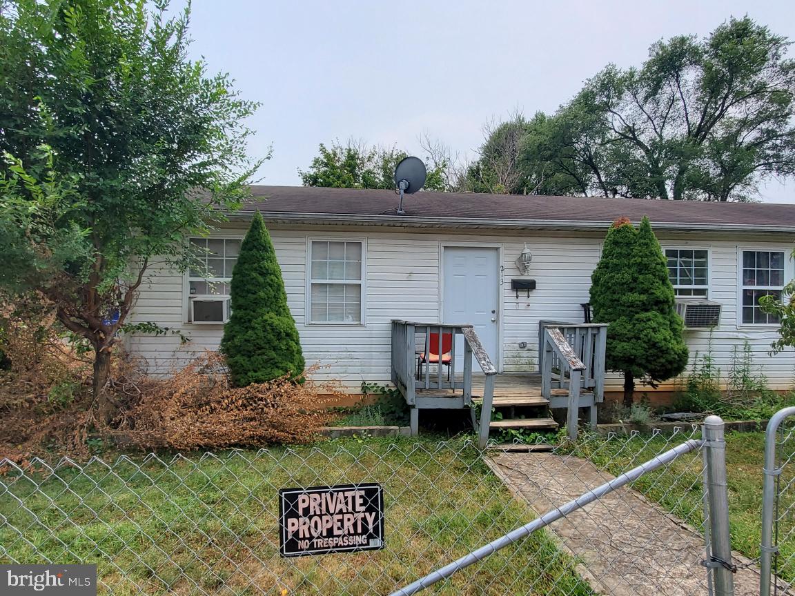 211 Laurel Street Front Royal, VA 22630 - Photo 2 of 5 a view of a house with backyard and sitting area