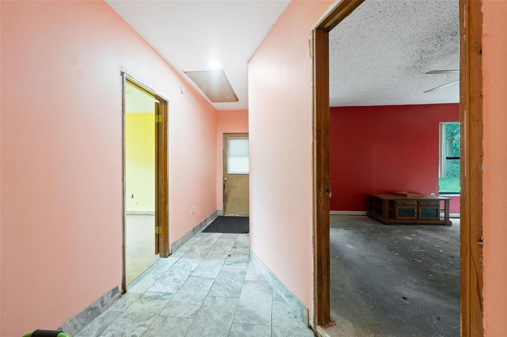 18160 Spangler Avenue Brooksville, FL 34604 - Photo 23 of 37 a view of a hallway with a elevator