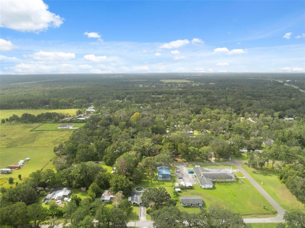 18160 Spangler Avenue Brooksville, FL 34604 - Photo 37 of 37 a view of a lake with a city