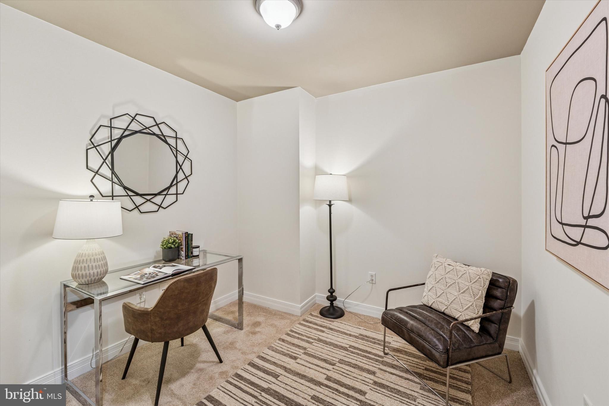 1600 Arch Street, Unit 1706 Philadelphia, PA 19103 - Photo 17 of 34 a living room with furniture and a window