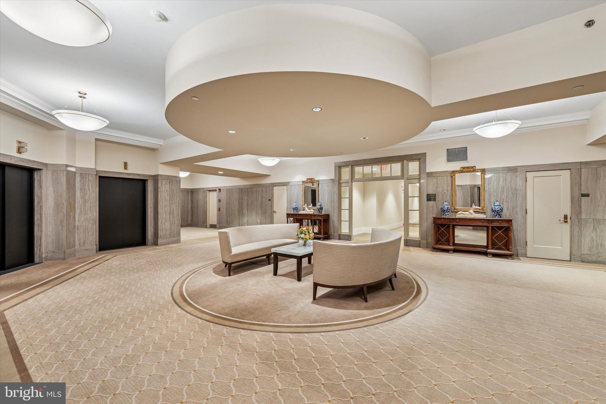 1600 Arch Street, Unit 1706 Philadelphia, PA 19103 - Photo 2 of 34 a living room with couches and a dining table with kitchen view