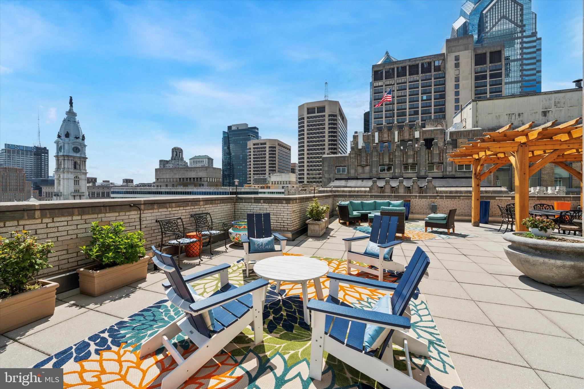 1600 Arch Street, Unit 1706 Philadelphia, PA 19103 - Photo 22 of 34 a view of a terrace with furniture and stove