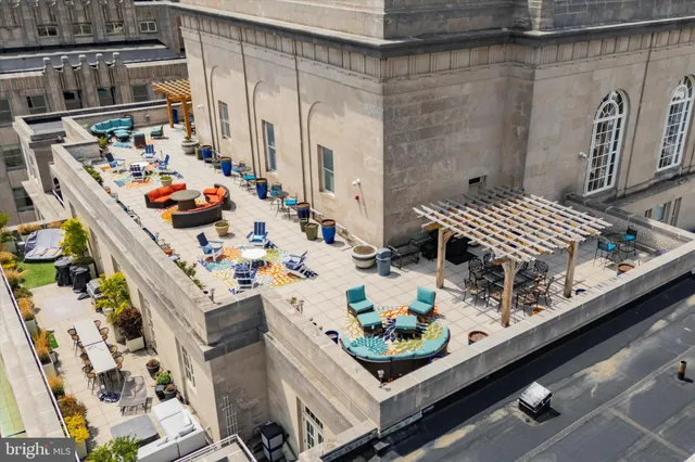 a view of barbecue area with seating area