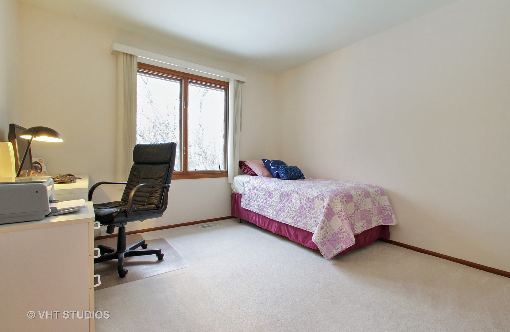 2740 Landwehr Road Northbrook, IL 60062 - Photo 13 of 15 a bedroom with a bed and a desk