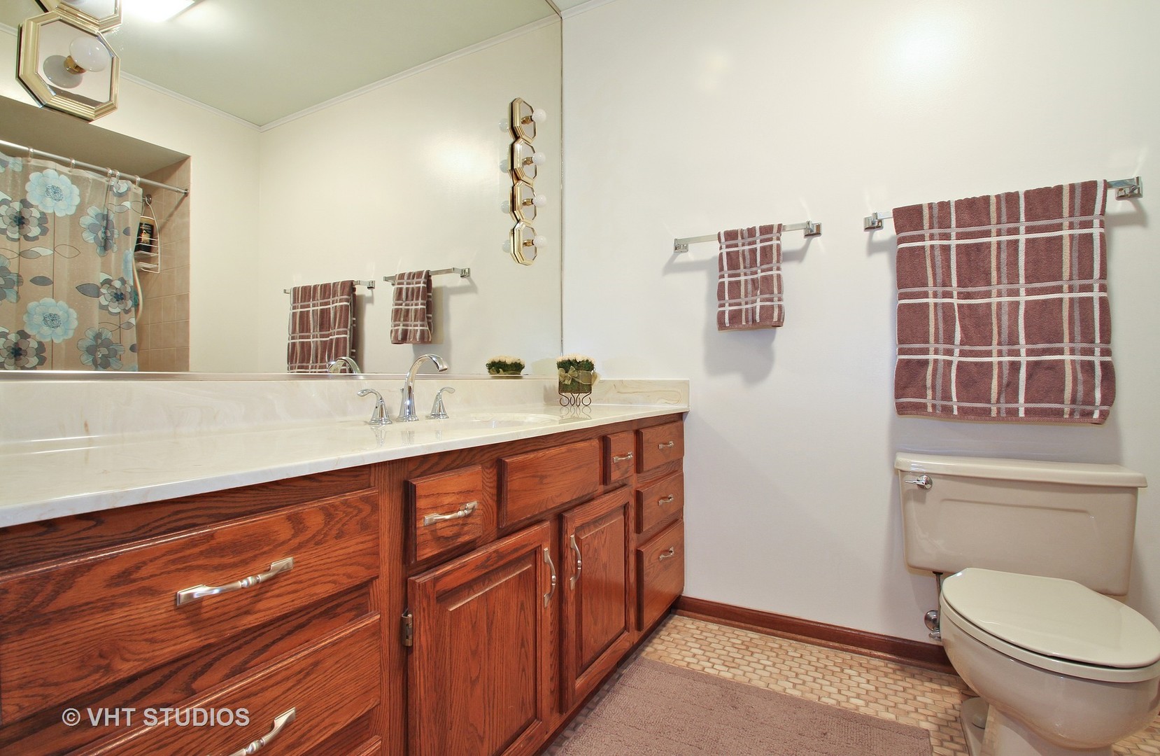2740 Landwehr Road Northbrook, IL 60062 - Photo 14 of 15 a bathroom with a sink a toilet and shower