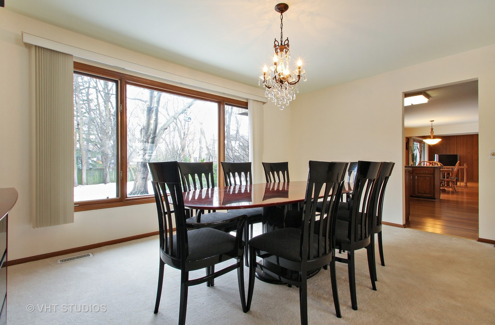 2740 Landwehr Road Northbrook, IL 60062 - Photo 4 of 15 a view of a dining room with furniture window and wooden floor