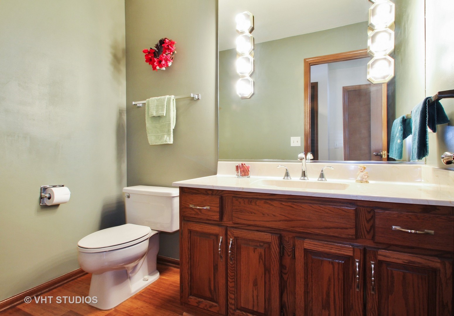 2740 Landwehr Road Northbrook, IL 60062 - Photo 8 of 15 a bathroom with a toilet sink and mirror