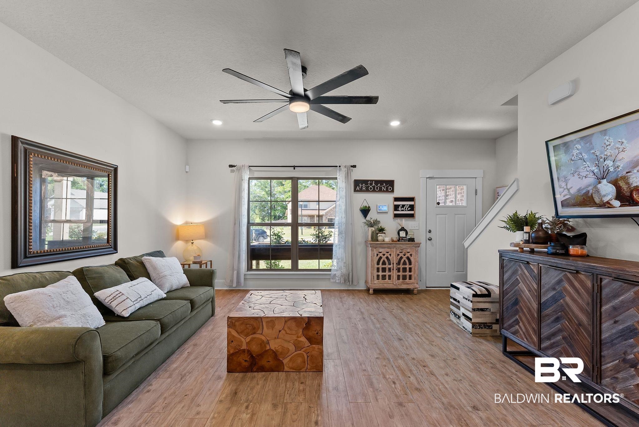16607 Prado Loop Loxley, AL 36551 - Photo 9 of 46 Open-concept living area featuring wood-finish flooring, recessed lighting, and a modern ceiling fan