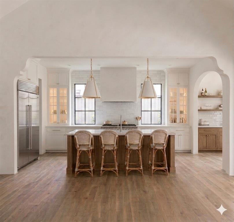 3830 Dunhaven Road Dallas, TX 75220 - Photo 2 of 21 a view of a dining room with furniture and wooden floor