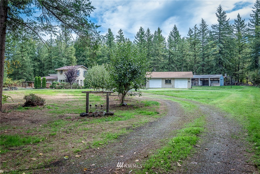 7586 Goodwin Road Everson, WA 98247 - Photo 2 of 22 a view of a house with a yard