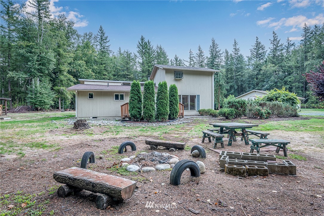 7586 Goodwin Road Everson, WA 98247 - Photo 17 of 22 a view of a backyard with sitting area