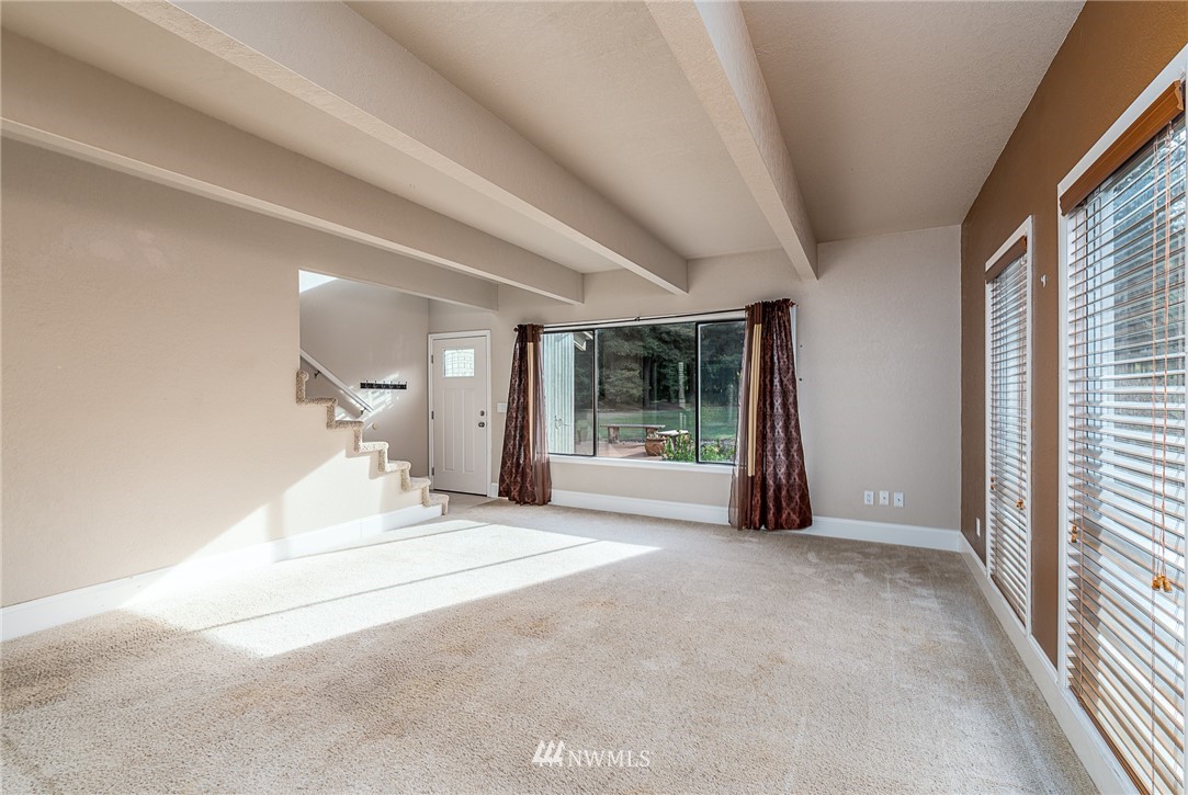 7586 Goodwin Road Everson, WA 98247 - Photo 4 of 22 a view of a livingroom with a staircase