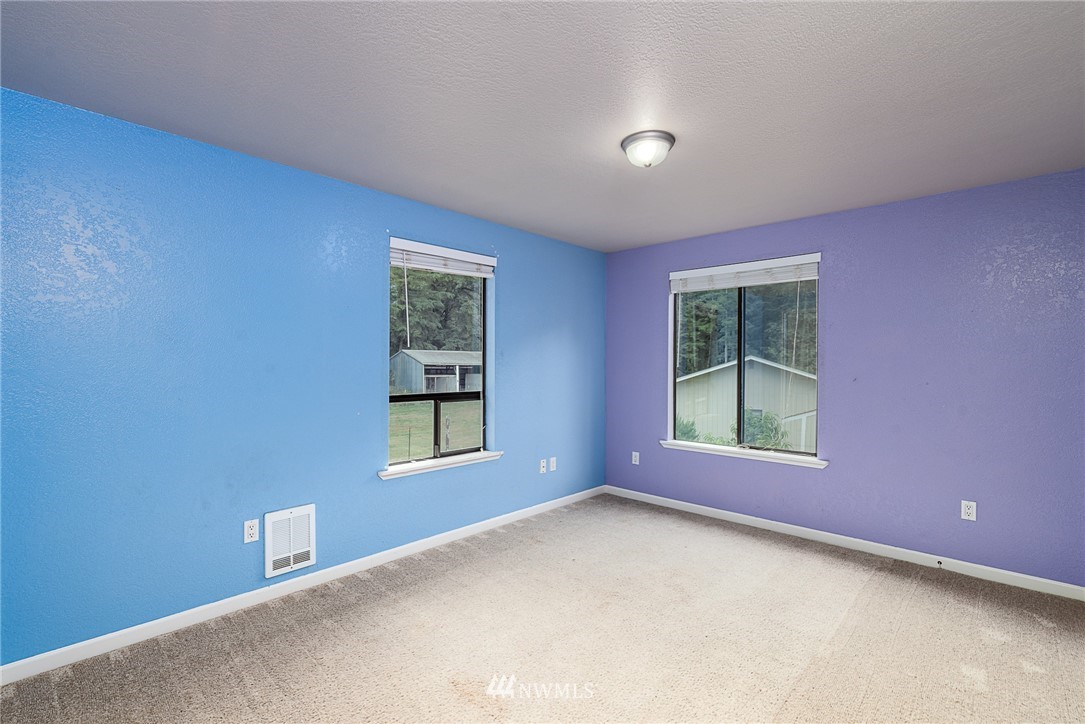 7586 Goodwin Road Everson, WA 98247 - Photo 7 of 22 an empty room with windows