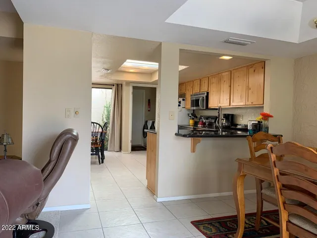 a view of a bedroom with furniture and staircase