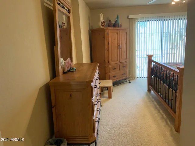 a bathroom with a sink vanity and a mirror