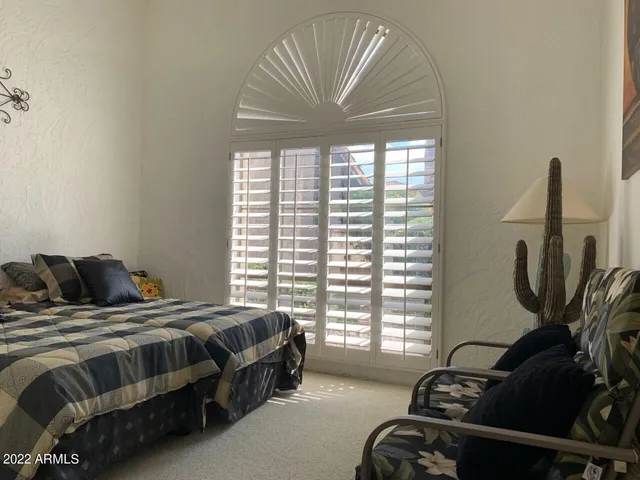 a view of a backyard of the house