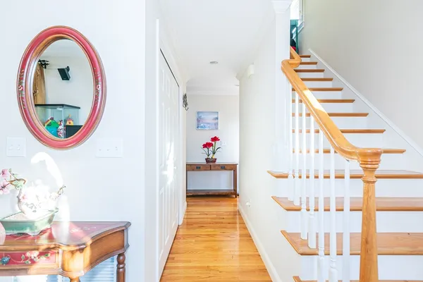 an entryway with furniture and garden view