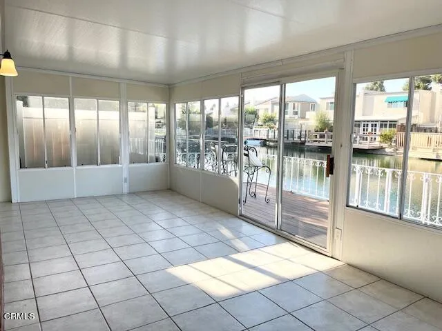 a sign broad in front of the tree