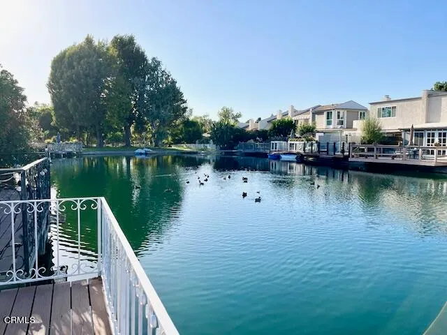 a balcony with a water view