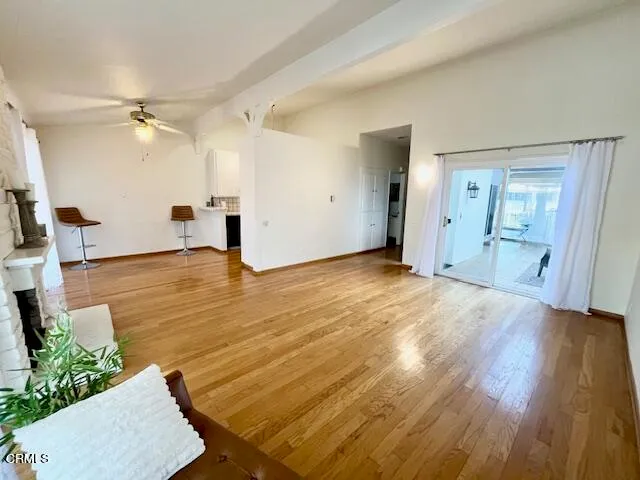 a kitchen with furniture and window