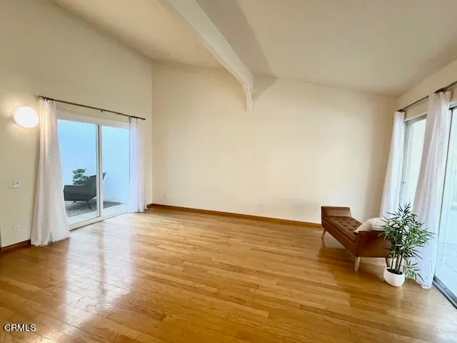 a kitchen with granite countertop a sink stainless steel appliances and cabinets