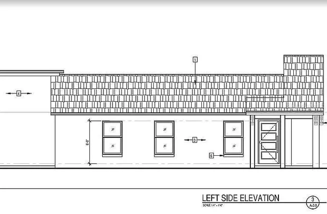 a black and white photo of a lake