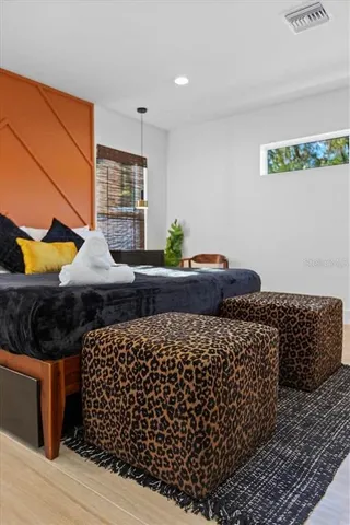 a kitchen with stainless steel appliances a sink dishwasher a stove and a refrigerator