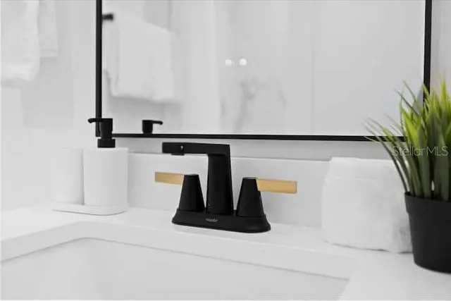 a view of a living room with a fireplace