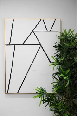 a kitchen with a refrigerator and a stove