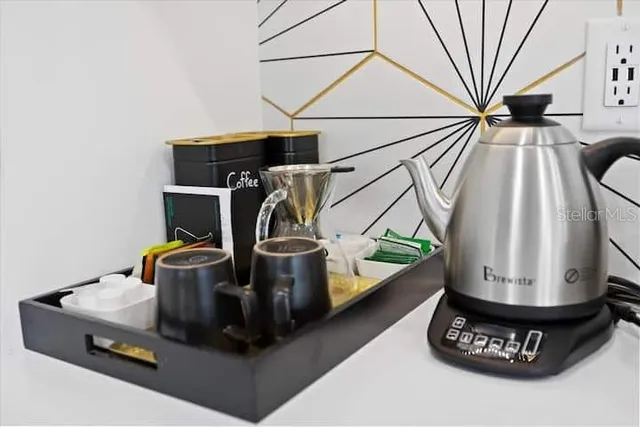 a vase of flowers sitting on a table