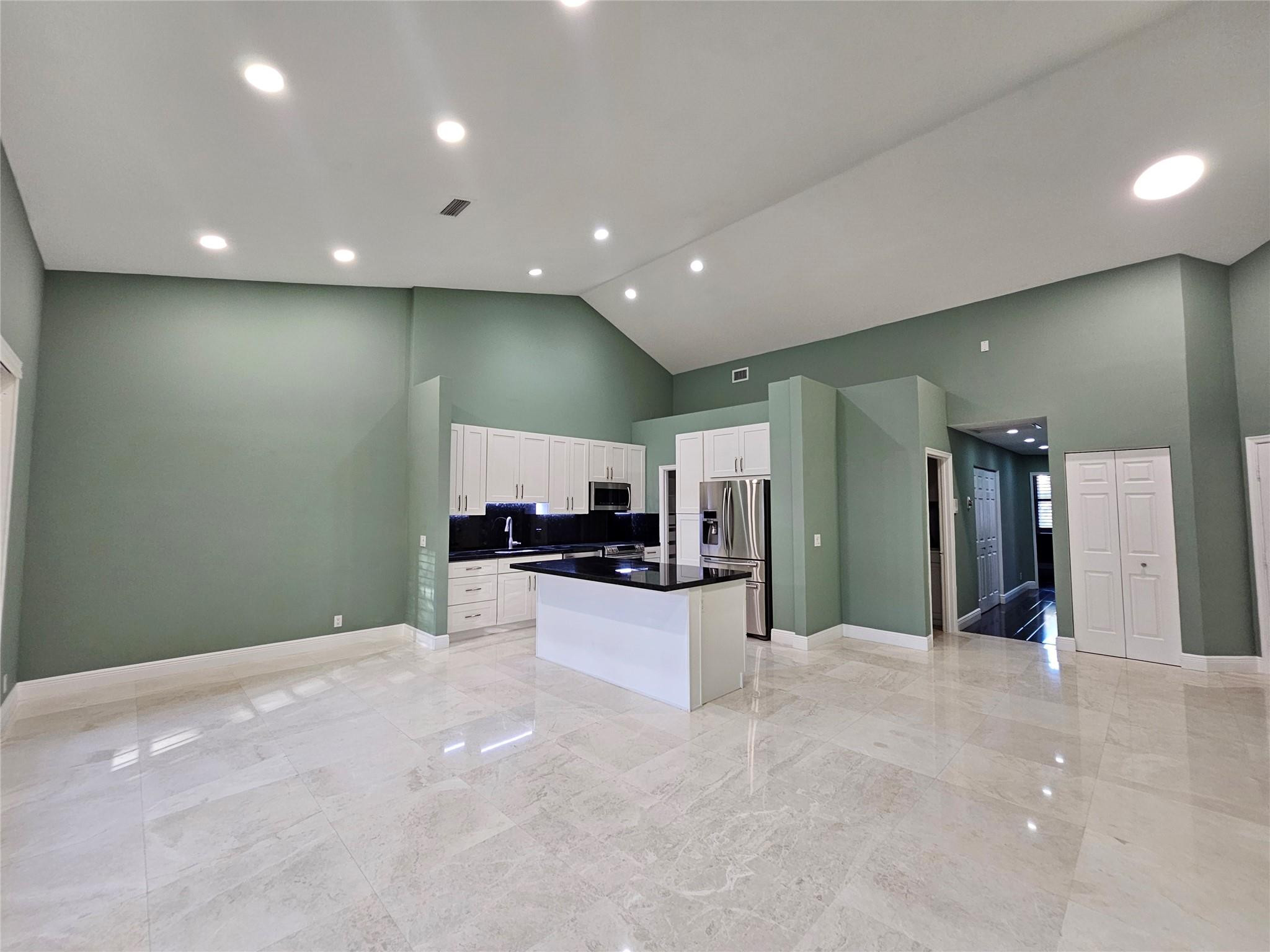 5770 Coach House Circle, Unit F Boca Raton, FL 33486 - Photo 4 of 21 Living Room/Dining Room/Kitchen