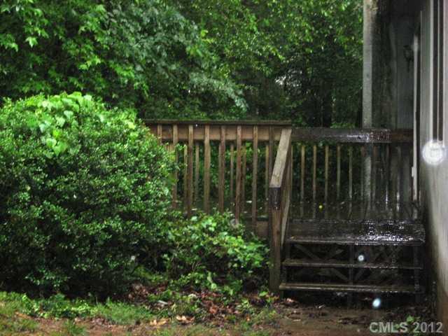 9283 Ladson Road Fort Mill, SC 29707 - Photo 14 of 16 a view of small garden with wooden fence
