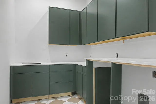 a bathroom with a sink and vanity