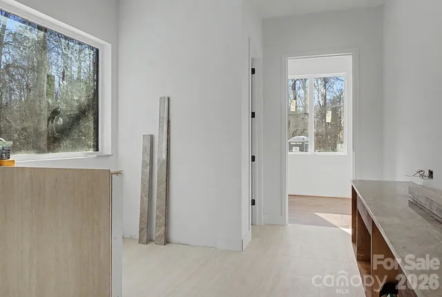 a view of a room that has a window