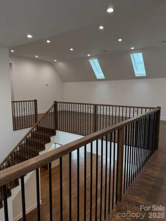 a view of entryway with wooden floor