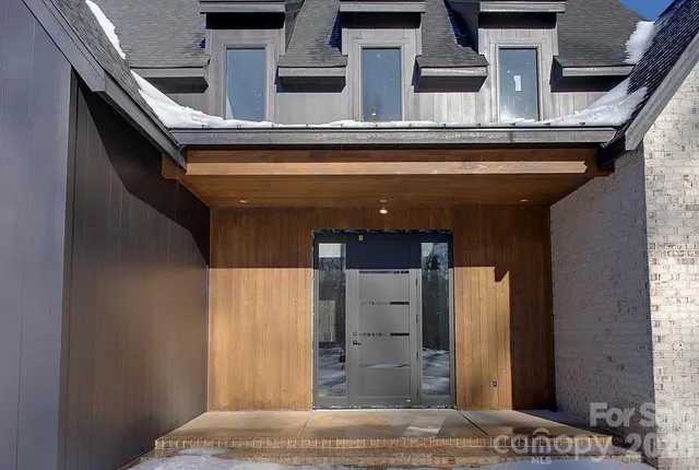 front view of a house with a balcony