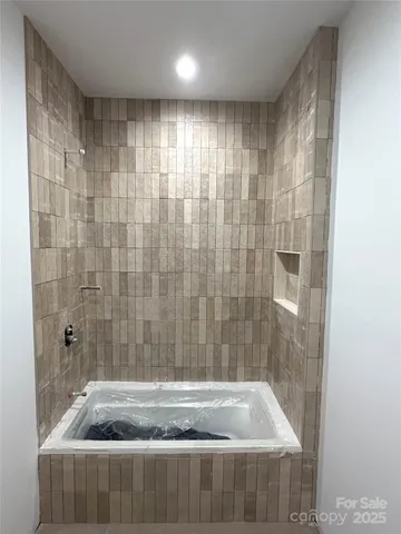 a view of a bathroom with shower