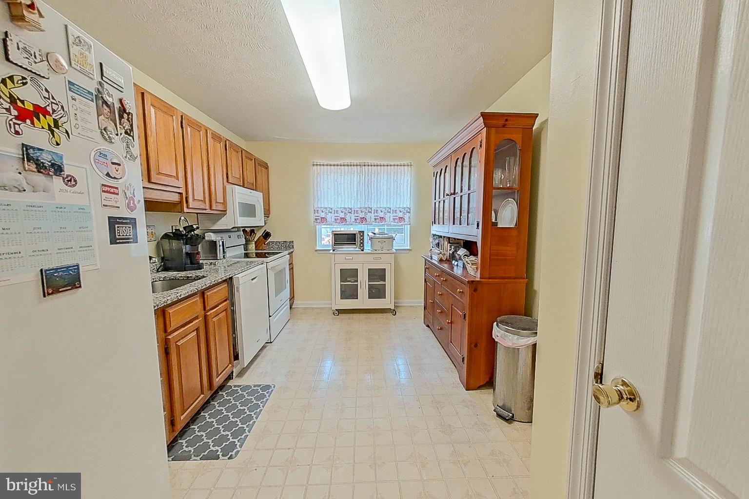 1 Bancroft Street Taneytown, MD 21787 - Photo 12 of 35 a kitchen with stainless steel appliances a refrigerator and a stove